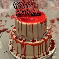Angela's Bakery & Deli - "Scream" themed birthday cake with delicious vanilla cake top layer and red velvet cake second layer.
