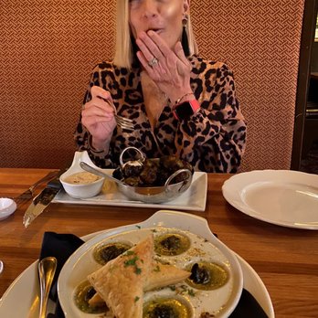 Raindancer Steakhouse - Escargot with Puff Pastry Crispy Brussel Sprouts - Steakhouses Near Me - West Palm Beach, Florida