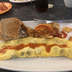 Western omelette. "Home fry's" and wheat toast.