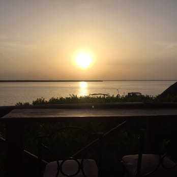19.5 Km Restaurant - The tables overlooking the lagoon were perfect for watching the sunset. - Seafood Near Me - Cancún, ROO 19.5 Km Restaurant - The tables overlooking the lagoon were perfect for watching the sunset. - Seafood Near Me - Cancún, ROO
