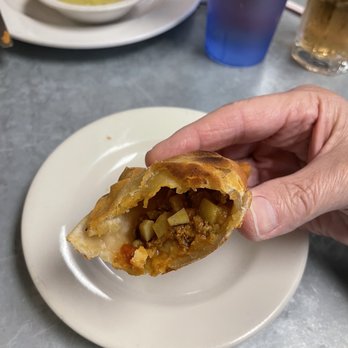 El Rincon Criollo - The filling of the empanadas. Notice how thin and flaky the shell is. - Cuban Near Me - Playa Del Rey, California El Rincon Criollo - The filling of the empanadas. Notice how thin and flaky the shell is. - Cuban Near Me - Playa Del Rey, California