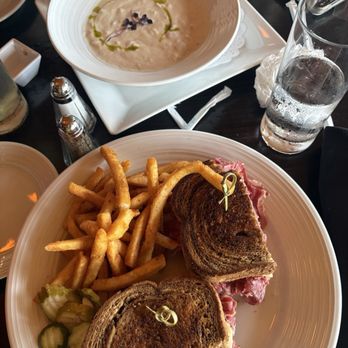 Paddy's Irish Pub & Restaurant - Smoked seafood chowder on top corned beef sandwich on the bottom with fries. - Gastropubs Near Me - Bar Harbor, Maine Paddy's Irish Pub & Restaurant - Smoked seafood chowder on top corned beef sandwich on the bottom with fries. - Gastropubs Near Me - Bar Harbor, Maine