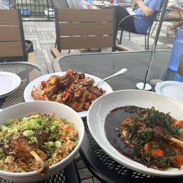 Duck Comfit, Duck Fried Rice, and Pork Belly Cheese Fries Duck Comfit, Duck Fried Rice, and Pork Belly Cheese Fries