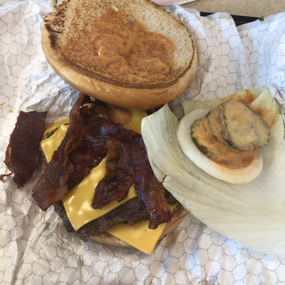 Wendy's - Messy not so awesome cheeseburger! Restaurant was empty no reason to serve it up like this. - Burgers Near Me - Weston, Florida