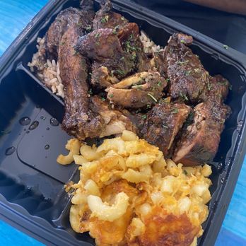 Booby's Kitchen - Jerk chicken over rice and peas and Macaroni & Cheese - Soul Food Near Me - Jacksonville, North Carolina Booby's Kitchen - Jerk chicken over rice and peas and Macaroni & Cheese - Soul Food Near Me - Jacksonville, North Carolina