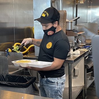 Gyro King - The person who would not give his name taking the vegetables off the plate - Mediterranean Near Me - Houston, Texas Gyro King - The person who would not give his name taking the vegetables off the plate - Mediterranean Near Me - Houston, Texas