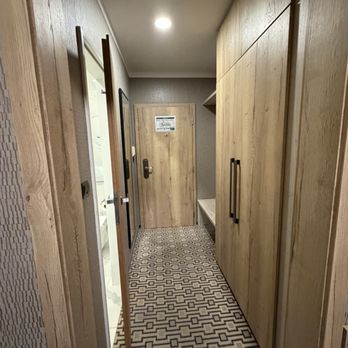 Astoria Hotel Prague - Entrance, closet, and door to bathroom - Hotels Near Me - Praha 1, Puerto Rico