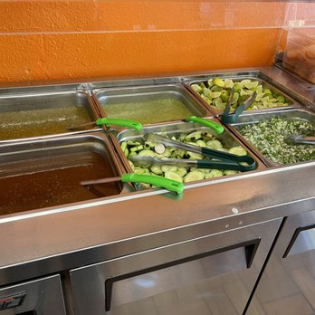 Tacos & Mariscos El Parque - Sauce station. They also had packed habanero sauce in a container on the right side. - Mexican Near Me - Gardena, California