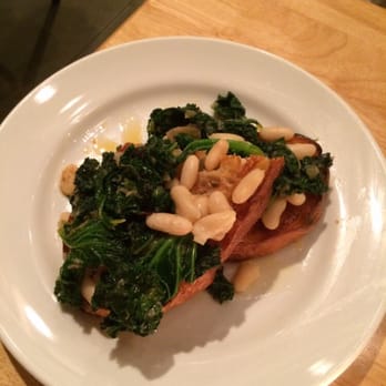 Pastaria - Braised Kale Bruschetta - Italian Near Me - Clayton, Missouri Pastaria - Braised Kale Bruschetta - Italian Near Me - Clayton, Missouri