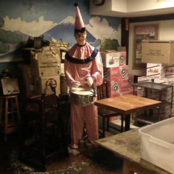 Kenka - Creepy giant clown at the back of the restaurant.  I'm pretty sure this thing comes alive at night and eats people. - Sushi Bars Near Me - New York, New York