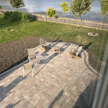 3D Brick Paving - a patio with chairs and a table - General Contractors Near Me - Des Plaines, Illinois