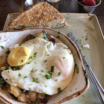 First Watch - Over cooked basted eggs on skillet market hash - Breakfast & Brunch Near Me - Lakeland, Florida