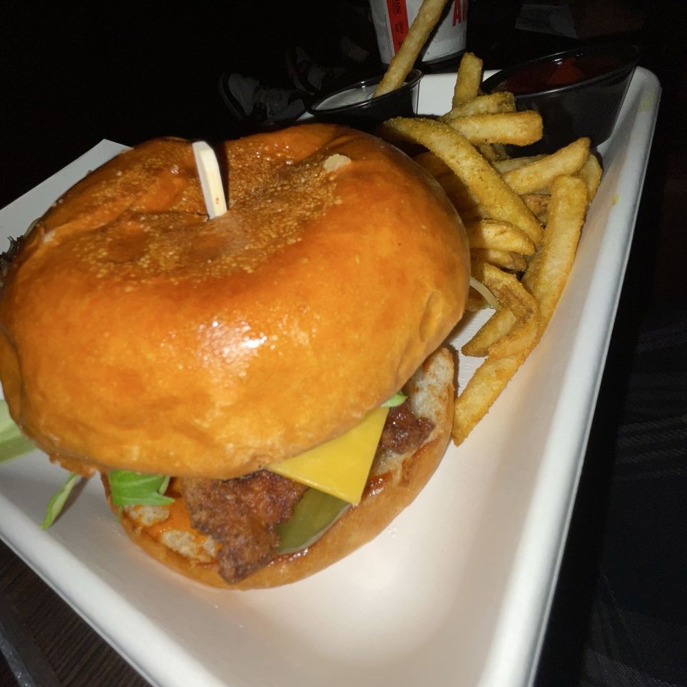 Cinemark Signature Chicken Sandwich with Curry Fries.