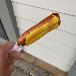 Two pronto pups painted with Ketchup and mustard Two pronto pups painted with Ketchup and mustard