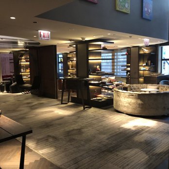 Virgin Hotels Chicago - The other half of the main hang out bar. There is a HUGE cool table thats a fav spot and a nook. - Hotels Near Me - Chicago, Illinois Virgin Hotels Chicago - The other half of the main hang out bar. There is a HUGE cool table thats a fav spot and a nook. - Hotels Near Me - Chicago, Illinois