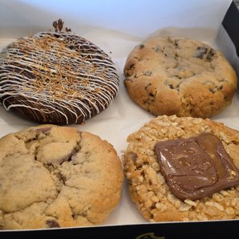 Crave Cookies - Dubai Chocolate (top left), Milk Choc Chip, Semi Sweet Choc Chip (bottom left corner), PB Caramel Crack - Desserts Near Me - Greendale, Wisconsin Crave Cookies - Dubai Chocolate (top left), Milk Choc Chip, Semi Sweet Choc Chip (bottom left corner), PB Caramel Crack - Desserts Near Me - Greendale, Wisconsin