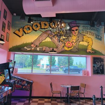 Voodoo Doughnut - Inside Voodoo Doughnuts Oak Grove. Only one table with chairs so snatch it up quick if you want to sit a bit. - Donuts Near Me - Milwaukie, Oregon Voodoo Doughnut - Inside Voodoo Doughnuts Oak Grove. Only one table with chairs so snatch it up quick if you want to sit a bit. - Donuts Near Me - Milwaukie, Oregon