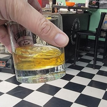 Electric Empire Barber Shop - Oban whisky while I wait for my appointment - Barbers Near Me - Long Beach, California