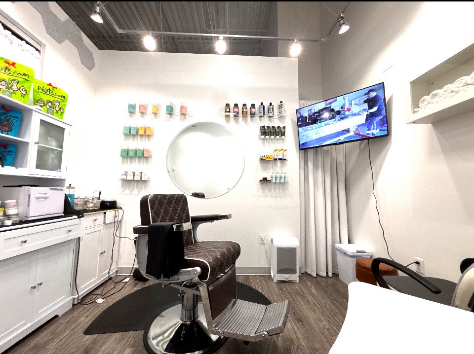 Candi The Barber Logo