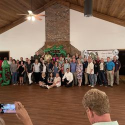 Steele Creek Lodge - A class reunion inside the lodge in front of the fireplace