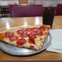 Lunch special. 2 slices, up to two toppings and soda for under $10