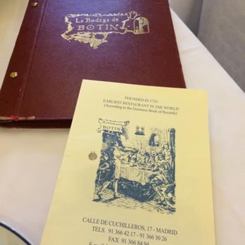 Botín - The menu is the small paper  one (you can ask for a copy as a souvenir).  The burgundy one is the wine list. - Spanish Near Me - Madrid, M