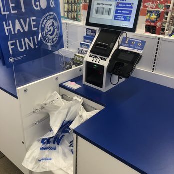 Five Below - Self-Checkout. - A self-checkout station at Five Below in Littleton, CO features a barcode scanner, a touchscreen display, and a payment terminal, with shopping bags nearby. - Discount Store Near Me - Littleton, Colorado