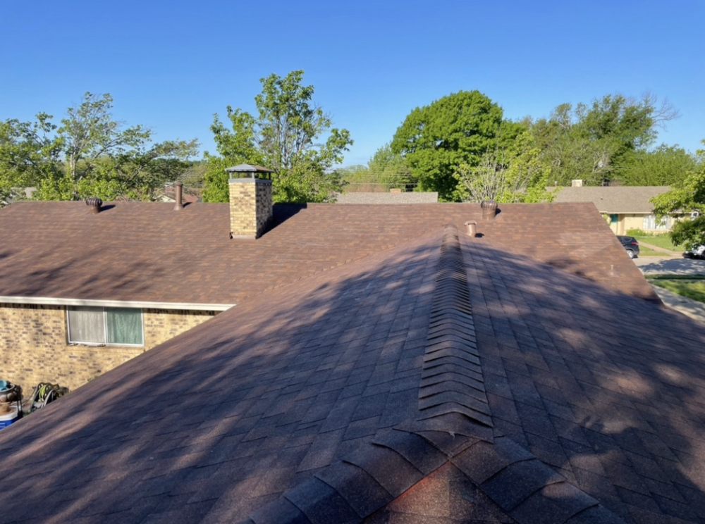 Slide of Homer’s Roofing & Construction