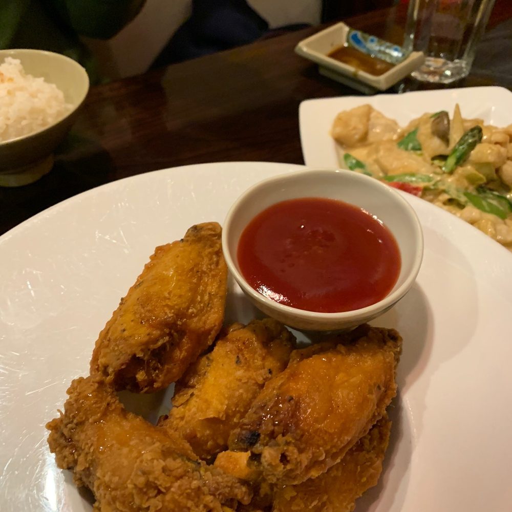 Asian Bistro - a plate of fried chicken and a bowl of sauce - Asian Fusion Near Me - Mansfield, Connecticut Asian Bistro - a plate of fried chicken and a bowl of sauce - Asian Fusion Near Me - Mansfield, Connecticut