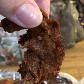 Pizza Joint - a hand holding a piece of fried food - Pizza Near Me - Gloversville, New York Pizza Joint - a hand holding a piece of fried food - Pizza Near Me - Gloversville, New York