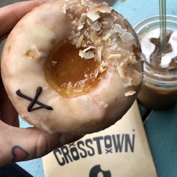 Crosstown Doughnuts & Coffee - Tropical Compote with Pineapple Glaze and Coconut Chips (vegan) - Donuts Near Me - London, XGL Crosstown Doughnuts & Coffee - Tropical Compote with Pineapple Glaze and Coconut Chips (vegan) - Donuts Near Me - London, XGL