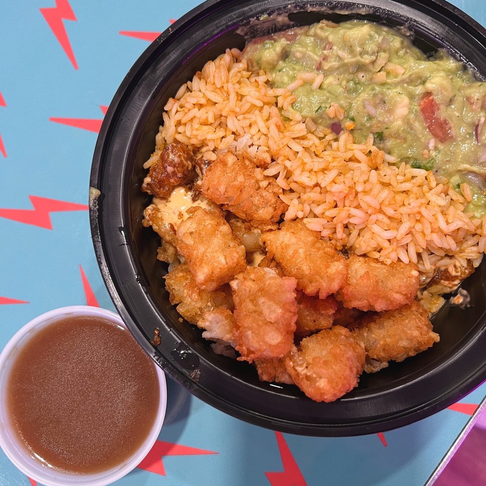 Cantina Bowl with nitro shrimp, tater tots, guacamole, and mexican gravy