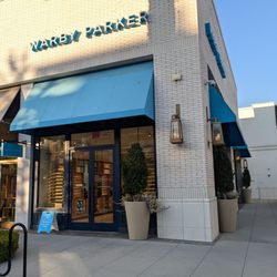 Warby Parker 2nd & PCH - Storefront. Photo was taken from the ground level of 2nd and PCH