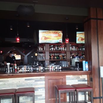 The Cabin Pub + Party - a bar with stools - Pubs Near Me - Edmonton, Alberta
