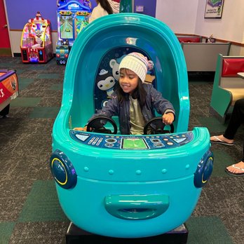 Chuck E. Cheese - Daughter playing game - Pizza Near Me - Bell, California Chuck E. Cheese - Daughter playing game - Pizza Near Me - Bell, California