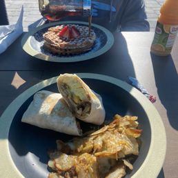 Breakfast burrito and strawberry waffles Breakfast burrito and strawberry waffles
