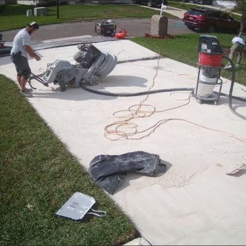 Shark Coatings - Shark Skin Coating driveway preparation. - Flooring Near Me - Jacksonville, Florida Shark Coatings - Shark Skin Coating driveway preparation. - Flooring Near Me - Jacksonville, Florida