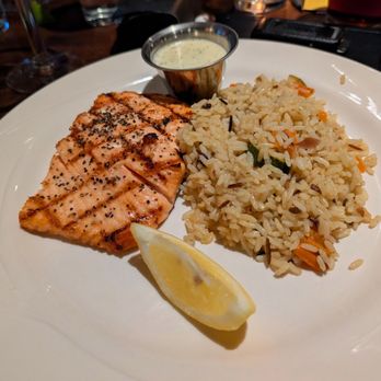 Pelican's West - Salmon and rice pilaf. My dish. So good.  3/26/26 - Seafood Near Me - Albuquerque, New Mexico