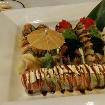 Naka Sushi - Top left baked salmon roll. Middle is out of control roll. Far right was the hard rock roll and bottom was the delicious philly roll. - Sushi Bars Near Me - Albuquerque, New Mexico Naka Sushi - Top left baked salmon roll. Middle is out of control roll. Far right was the hard rock roll and bottom was the delicious philly roll. - Sushi Bars Near Me - Albuquerque, New Mexico