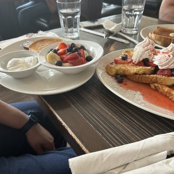 John's Family Restaurant - a plate of french toast with berries and whipped cream - Breakfast & Brunch Near Me - Brampton, Ontario
