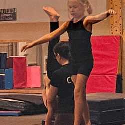 Surprise Angels - Balancing on the beam and help with beam handstands.