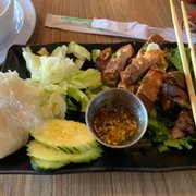Photo of Spicy Joi Banh Mi-Noodles-Lao Street Food - Concord, CA, United States. Laos Street Food Combo: Crispy Pirk Belly Combo with with sticky rice or steamed rice &lime or pepper dipping sauce