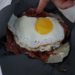 Sunnyside up egg cheeseburger -$14.99 (sub cheese for bun - add $3.00)
