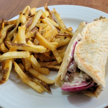 Agapé Mediterranean - Pita with chicken shawarma, spicy feta, and toppings with a side of fries - Mediterranean Near Me - Westerville, Ohio Agapé Mediterranean - Pita with chicken shawarma, spicy feta, and toppings with a side of fries - Mediterranean Near Me - Westerville, Ohio