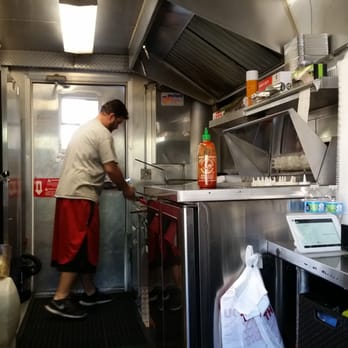 Hefty Gyros - The truck operator working his magic in his kitchen on wheels! - Food Trucks Near Me