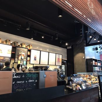Starbucks - the interior of a coffee shop - Coffee & Tea Near Me - Montreal, Quebec Starbucks - the interior of a coffee shop - Coffee & Tea Near Me - Montreal, Quebec