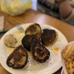 Shanghai's Best - Super burnt dumpling bottoms. Should have made a new batch or refunded the $. We get golden crispy brown and this isn't it.