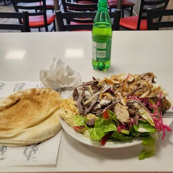 Shawarma Palace - a plate of food and a bottle of water - Middle Eastern Near Me - Ottawa, Ontario