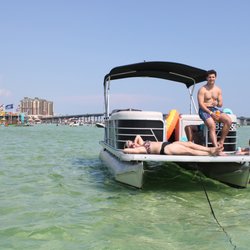 Unwind with friends and family at Crab Island!  Our boats offer the perfect space for you and the family to relax and soak up!