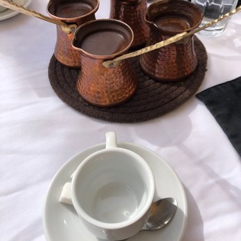 Rayoog Cafe - Turkish coffee. True to perfection. If you don't like it grainy, use spoon to hold back grounds. - Breakfast & Brunch Near Me - Gilbert, Arizona Rayoog Cafe - Turkish coffee. True to perfection. If you don't like it grainy, use spoon to hold back grounds. - Breakfast & Brunch Near Me - Gilbert, Arizona